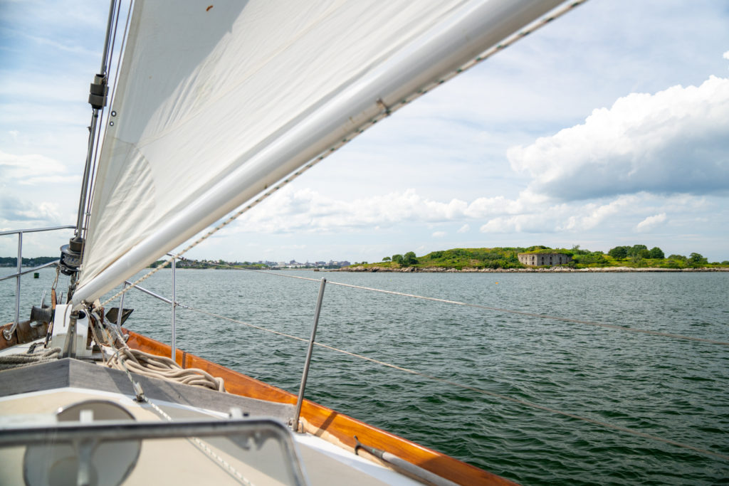 Sailboat Glimpsing Fort Gorges Military Fort, Photo Courtesy of Kirsten Alana / GLP Films