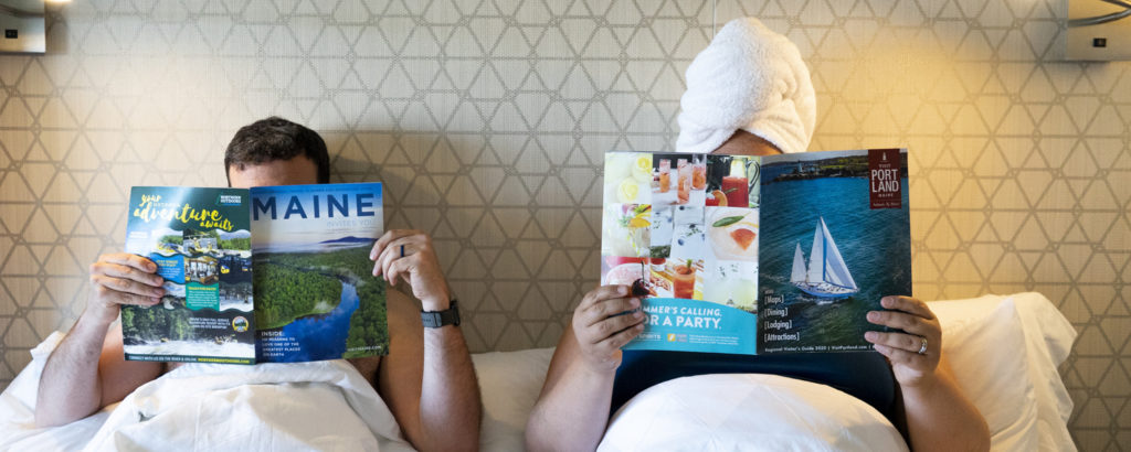 Lounging in Bed with Magazines, Photo Credit: Capshore Photography