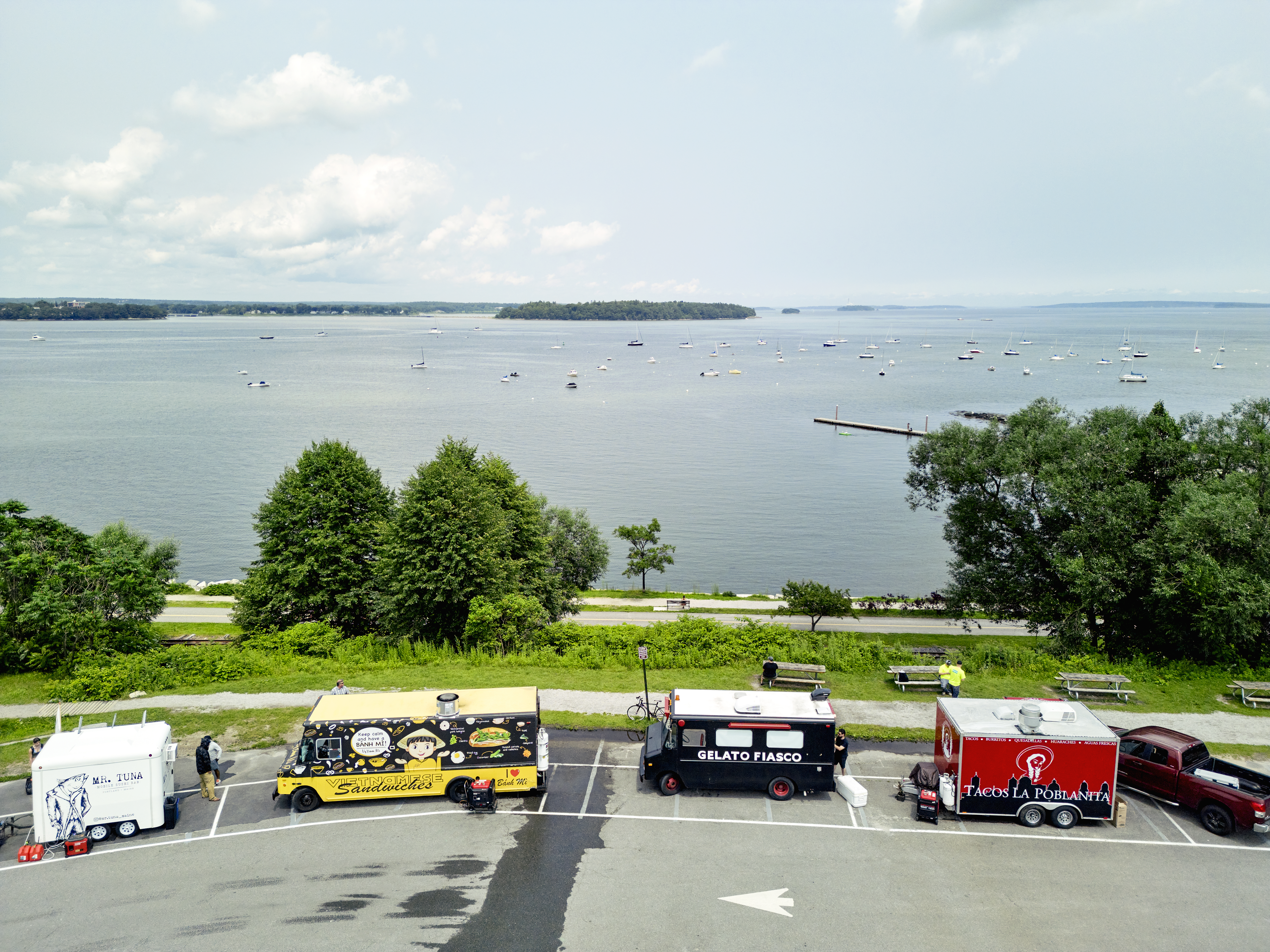 Food trucks by water, Photo credit: Lone Spruce Creative, courtesy of Maine Office of Tourism