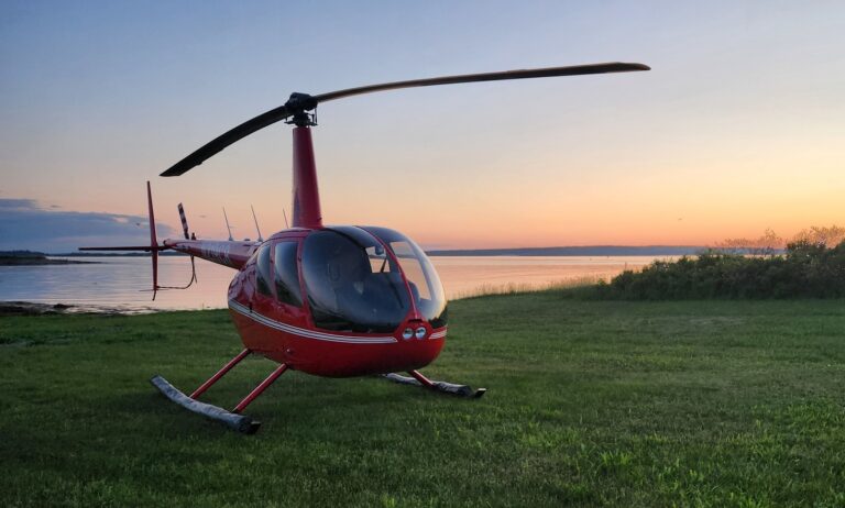 Helicopter at Sunset. Photo Credit: Pine Tree Helicopters