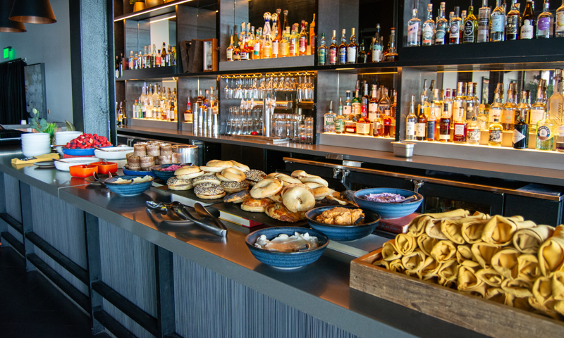 Breakfast buffet spread on bar; Photo Credit: Lauren Peters at Visit Portland