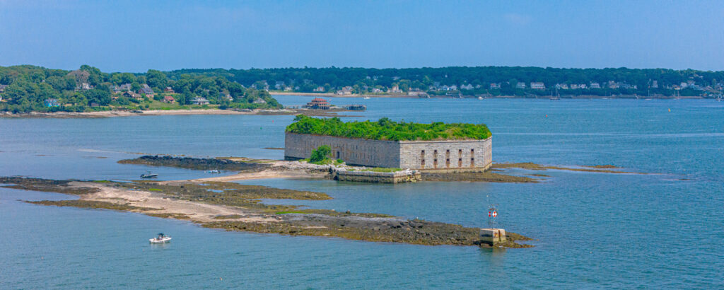 Fort Gorges in blue Casco Bay on sunny day; Photo Credit: Peter G. Morneau Photography